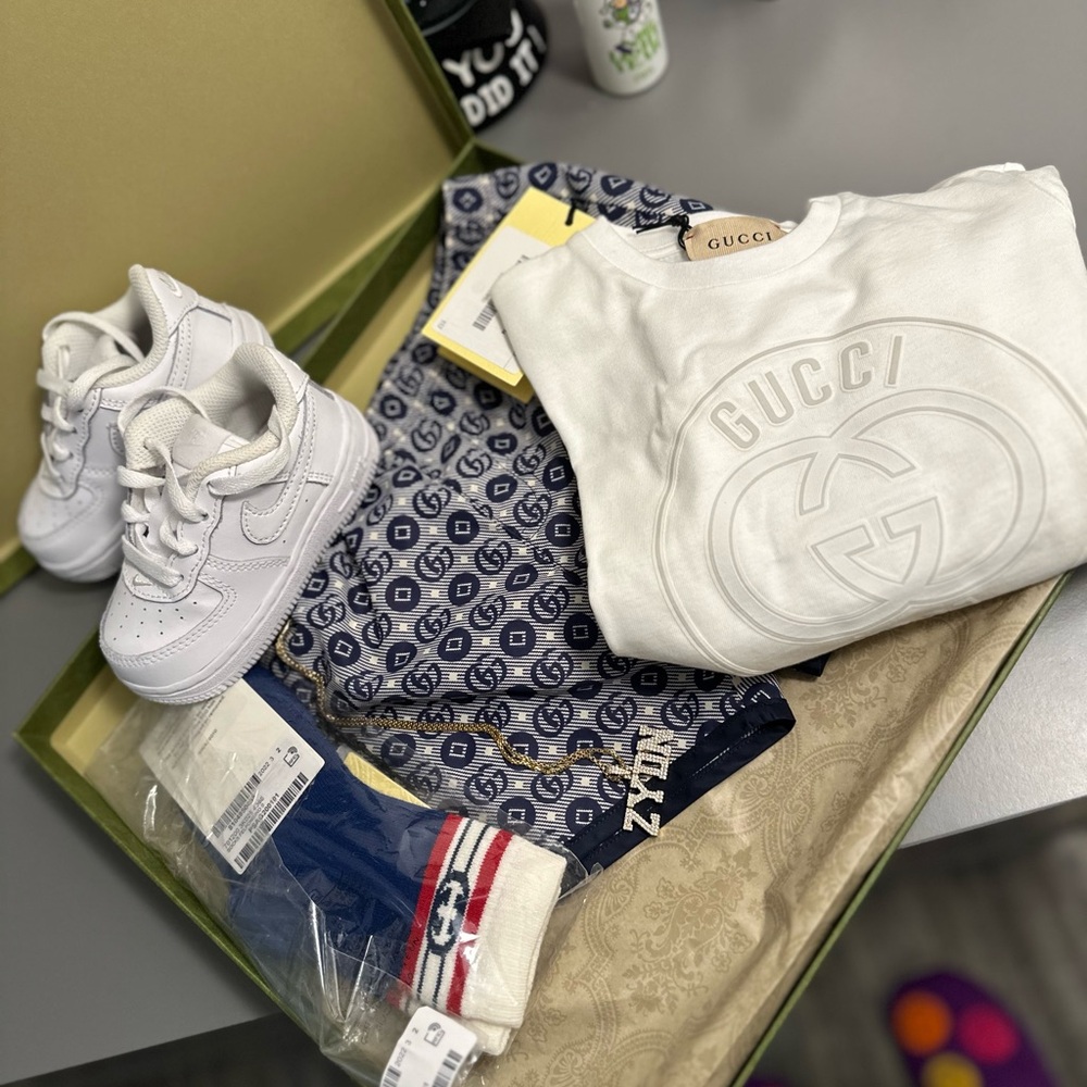 selling gucci shorts, gucci shirt, gucci socks .